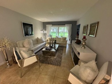 THIS IS A RARE FIRST FLOOR CORNER CONDO AND IT IS IN EXCELLENT on Wynmoor Golf Course in Florida - for sale on GolfHomes.com, golf home, golf lot