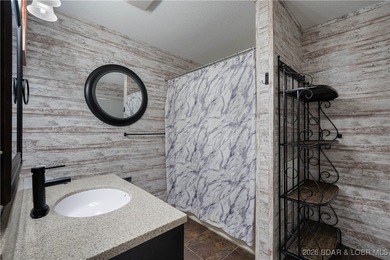 $5,000 SELLERS CONCESSIONS PLUS A ONE YEAR HOME WARRANTY on Lake Valley Country Club in Missouri - for sale on GolfHomes.com, golf home, golf lot