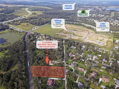 Build your private estate on 1.2 acres in the rolling hills of on Lake Jovita Golf and Country Club in Florida - for sale on GolfHomes.com, golf home, golf lot