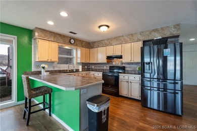 $5,000 SELLERS CONCESSIONS PLUS A ONE YEAR HOME WARRANTY on Lake Valley Country Club in Missouri - for sale on GolfHomes.com, golf home, golf lot