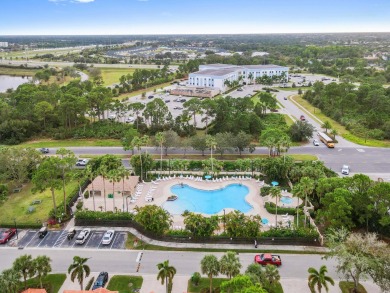 Welcome to your first floor, end-unit condo overlooking the on The Legacy Golf and Tennis Club in Florida - for sale on GolfHomes.com, golf home, golf lot