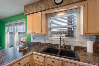 $5,000 SELLERS CONCESSIONS PLUS A ONE YEAR HOME WARRANTY on Lake Valley Country Club in Missouri - for sale on GolfHomes.com, golf home, golf lot