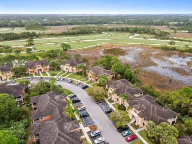 Welcome to your first floor, end-unit condo overlooking the on The Legacy Golf and Tennis Club in Florida - for sale on GolfHomes.com, golf home, golf lot