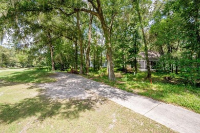 This charming 3-bedroom, 2-bathroom home in Haile Plantation's on Haile Plantation Golf and Country Club in Florida - for sale on GolfHomes.com, golf home, golf lot