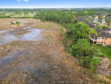 Welcome to your first floor, end-unit condo overlooking the on The Legacy Golf and Tennis Club in Florida - for sale on GolfHomes.com, golf home, golf lot