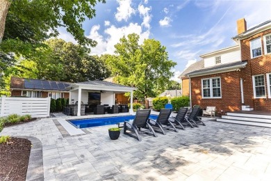 Welcome to this stunning all-brick home in Greenbrier's coveted on Greenbrier Country Club in Virginia - for sale on GolfHomes.com, golf home, golf lot