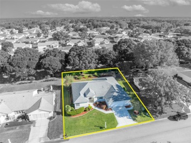 Elegant & Upgraded Aspen Extended in Spruce Creek Golf & Country on Eagle Ridge At Spruce Creek Country Club in Florida - for sale on GolfHomes.com, golf home, golf lot