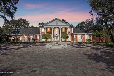 A rare gated estate set on nearly five private acres in Queens on Queens Harbour Yacht and Country Club in Florida - for sale on GolfHomes.com, golf home, golf lot