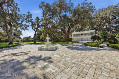 A rare gated estate set on nearly five private acres in Queens on Queens Harbour Yacht and Country Club in Florida - for sale on GolfHomes.com, golf home, golf lot