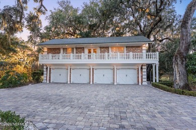 A rare gated estate set on nearly five private acres in Queens on Queens Harbour Yacht and Country Club in Florida - for sale on GolfHomes.com, golf home, golf lot