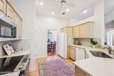 This custom-built home in the sought-after Woodlake section of on Eagle Harbor Golf Club in Florida - for sale on GolfHomes.com, golf home, golf lot