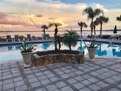 This 940 sq ft home offers an open floor plan and a bright on Lake Henry Golf Club in Florida - for sale on GolfHomes.com, golf home, golf lot