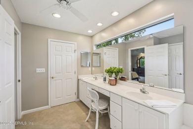 This custom-built home in the sought-after Woodlake section of on Eagle Harbor Golf Club in Florida - for sale on GolfHomes.com, golf home, golf lot