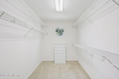 This custom-built home in the sought-after Woodlake section of on Eagle Harbor Golf Club in Florida - for sale on GolfHomes.com, golf home, golf lot