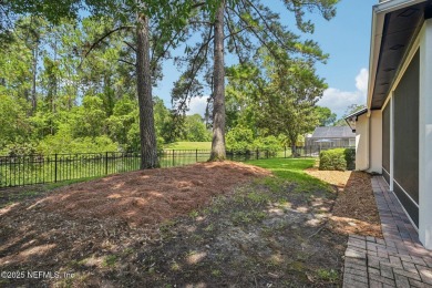 This custom-built home in the sought-after Woodlake section of on Eagle Harbor Golf Club in Florida - for sale on GolfHomes.com, golf home, golf lot