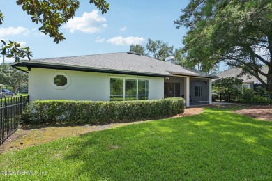 This custom-built home in the sought-after Woodlake section of on Eagle Harbor Golf Club in Florida - for sale on GolfHomes.com, golf home, golf lot