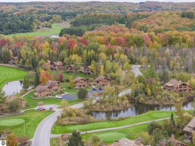 This delightful condo at Schuss Mountain Village in Shanty Creek on Schuss Mountain Golf Club in Michigan - for sale on GolfHomes.com, golf home, golf lot