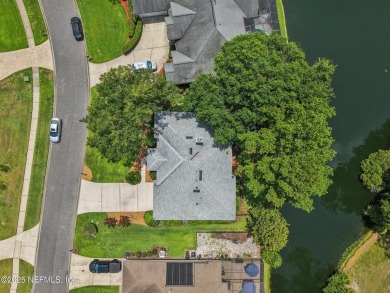 This custom-built home in the sought-after Woodlake section of on Eagle Harbor Golf Club in Florida - for sale on GolfHomes.com, golf home, golf lot