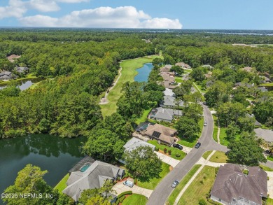 This custom-built home in the sought-after Woodlake section of on Eagle Harbor Golf Club in Florida - for sale on GolfHomes.com, golf home, golf lot