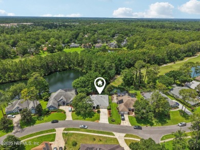 This custom-built home in the sought-after Woodlake section of on Eagle Harbor Golf Club in Florida - for sale on GolfHomes.com, golf home, golf lot