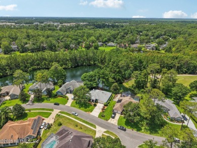 This custom-built home in the sought-after Woodlake section of on Eagle Harbor Golf Club in Florida - for sale on GolfHomes.com, golf home, golf lot