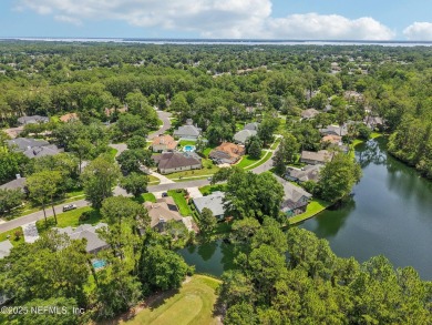 This custom-built home in the sought-after Woodlake section of on Eagle Harbor Golf Club in Florida - for sale on GolfHomes.com, golf home, golf lot