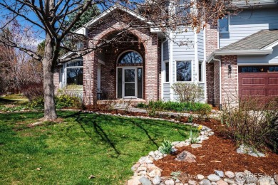 This stunning home in The Island at Coal Creek Ranch offers a on Coal Creek Golf Course in Colorado - for sale on GolfHomes.com, golf home, golf lot
