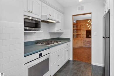 This classic brick ranch is quintessential Midland. The LaPelle on  in Michigan - for sale on GolfHomes.com, golf home, golf lot