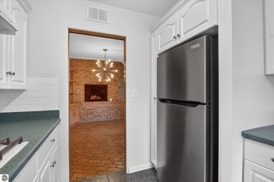 This classic brick ranch is quintessential Midland. The LaPelle on  in Michigan - for sale on GolfHomes.com, golf home, golf lot