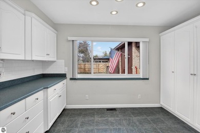 This classic brick ranch is quintessential Midland. The LaPelle on  in Michigan - for sale on GolfHomes.com, golf home, golf lot