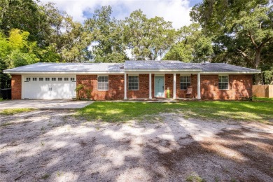 Welcome, golf enthusiasts! Step into this charming four-bedroom on Chiefland Golf and Country Club in Florida - for sale on GolfHomes.com, golf home, golf lot