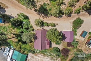 This log-sided home in Garden Valley has been lovingly on Terrace Lakes Golf Resort in Idaho - for sale on GolfHomes.com, golf home, golf lot