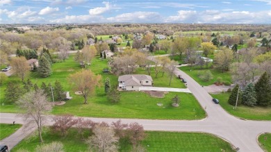 ONE acre corner lot, ONE owner, ONE of a kind walk-out rambler on Fox Hollow Golf Club  in Minnesota - for sale on GolfHomes.com, golf home, golf lot