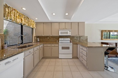 Watch the golfers putt from the extra large tiled patio of this on Chaparral Country Club in California - for sale on GolfHomes.com, golf home, golf lot