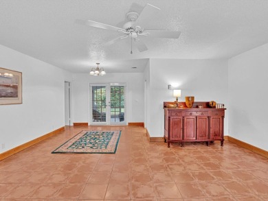 Imagine a Florida home with a sunny, tropical vibe, infused with on Lakeview Golf Club in Florida - for sale on GolfHomes.com, golf home, golf lot