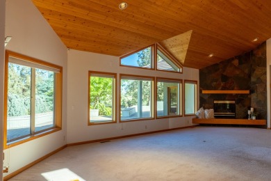 This spacious single level home, nestled on the 14th Fairway of on Eagle Crest Golf Resort - Resort Course in Oregon - for sale on GolfHomes.com, golf home, golf lot