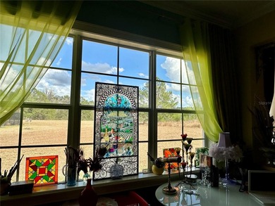 Nestled on a quiet cul-de-sac, In the golf community of Southern on Southern Hills Plantation Club in Florida - for sale on GolfHomes.com, golf home, golf lot