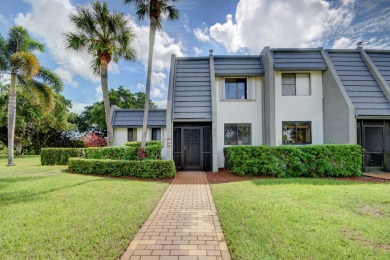 Beautifully maintained 3-bedroom, 3-bath corner unit on the golf on Fountains Golf and Country Club in Florida - for sale on GolfHomes.com, golf home, golf lot