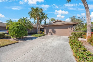 Beautifully UPDATED TURNKEY end unit villa with lots of natural on Palm Aire Country Club of Sarasota in Florida - for sale on GolfHomes.com, golf home, golf lot