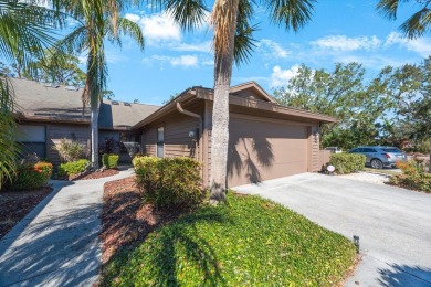 Beautifully UPDATED TURNKEY end unit villa with lots of natural on Palm Aire Country Club of Sarasota in Florida - for sale on GolfHomes.com, golf home, golf lot