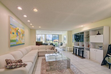 Beautifully maintained 3-bedroom, 3-bath corner unit on the golf on Fountains Golf and Country Club in Florida - for sale on GolfHomes.com, golf home, golf lot