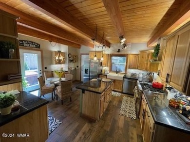 Here's your dream home crafted with love and precision. This on Pinetop Lakes Country Club in Arizona - for sale on GolfHomes.com, golf home, golf lot