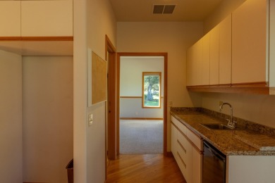 This spacious single level home, nestled on the 14th Fairway of on Eagle Crest Golf Resort - Resort Course in Oregon - for sale on GolfHomes.com, golf home, golf lot