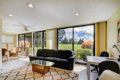 Beautifully maintained 3-bedroom, 3-bath corner unit on the golf on Fountains Golf and Country Club in Florida - for sale on GolfHomes.com, golf home, golf lot