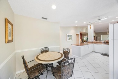 Beautifully UPDATED TURNKEY end unit villa with lots of natural on Palm Aire Country Club of Sarasota in Florida - for sale on GolfHomes.com, golf home, golf lot