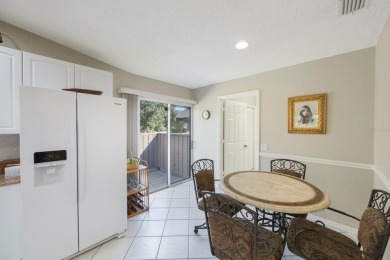 Beautifully UPDATED TURNKEY end unit villa with lots of natural on Palm Aire Country Club of Sarasota in Florida - for sale on GolfHomes.com, golf home, golf lot