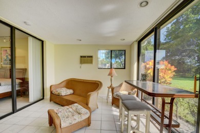 Beautifully maintained 3-bedroom, 3-bath corner unit on the golf on Fountains Golf and Country Club in Florida - for sale on GolfHomes.com, golf home, golf lot