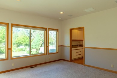 This spacious single level home, nestled on the 14th Fairway of on Eagle Crest Golf Resort - Resort Course in Oregon - for sale on GolfHomes.com, golf home, golf lot