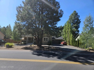 Here's your dream home crafted with love and precision. This on Pinetop Lakes Country Club in Arizona - for sale on GolfHomes.com, golf home, golf lot