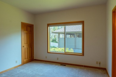 This spacious single level home, nestled on the 14th Fairway of on Eagle Crest Golf Resort - Resort Course in Oregon - for sale on GolfHomes.com, golf home, golf lot